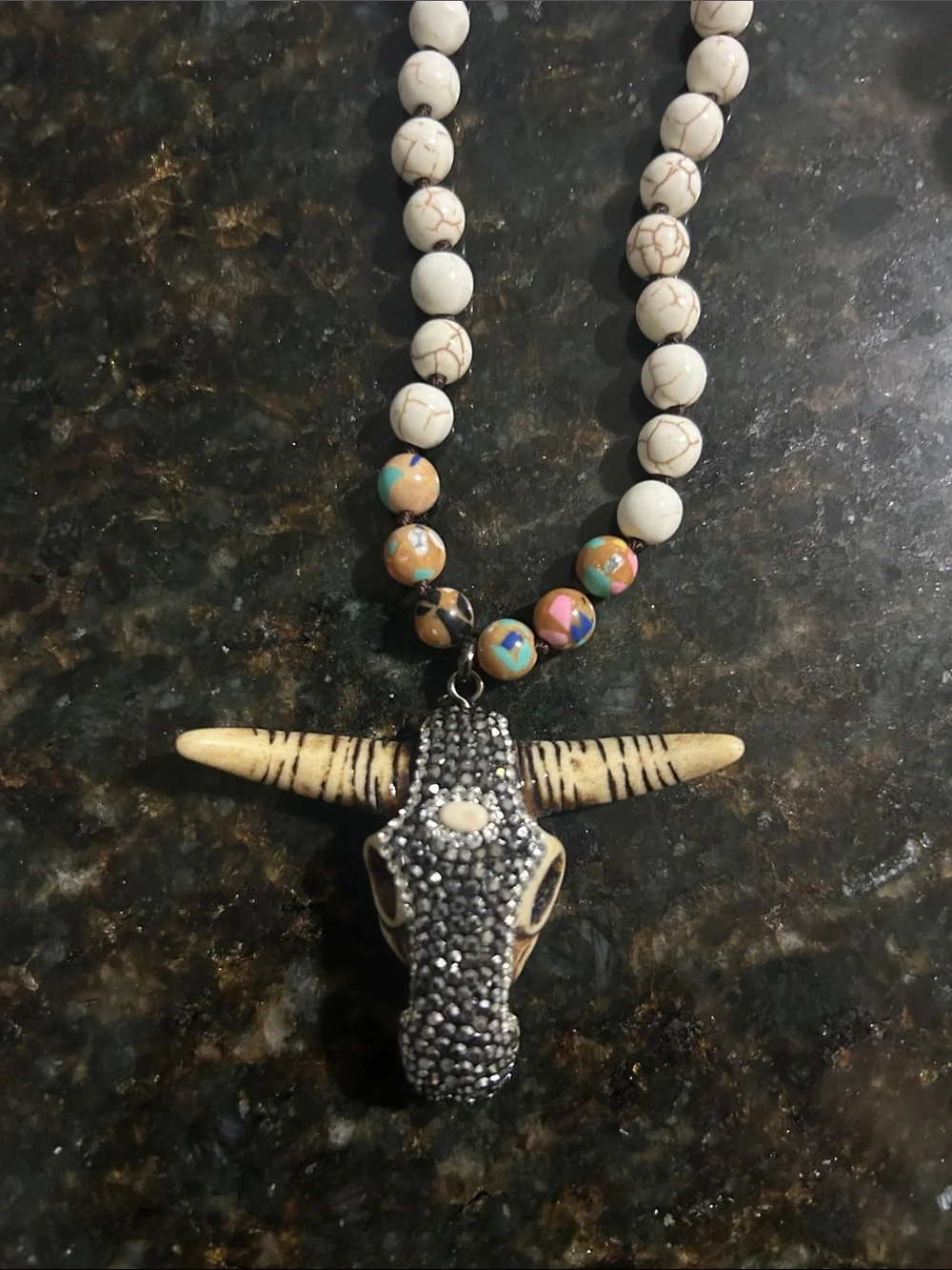 2 bracelets 1 necklace and 1 pair of earrings